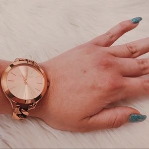 Michael Kors Rose Gold Runway Dial Twist Watch
